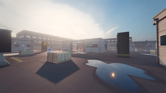 Wallpaper: ground level on Blacksite at dusk, long shadows and a puddle in front of the vault.